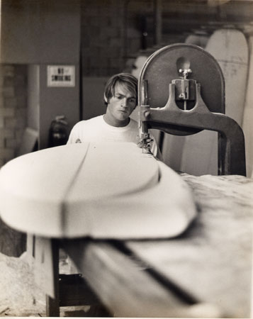 Dennis Bendadum cutting an outline on a bandsaw. G&S Factory Spring 1969